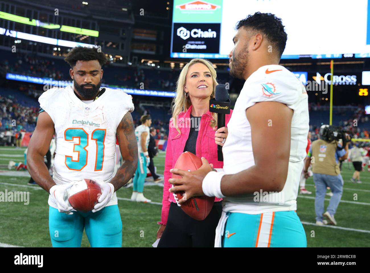 KANSAS CITY, MO - JANUARY 21: NBC Sports Melissa Stark interviews Kansas  City Chiefs quarterback Patrick Mahomes (15) and tight end Travis Kelce  (87) after an AFC divisional playoff game between the