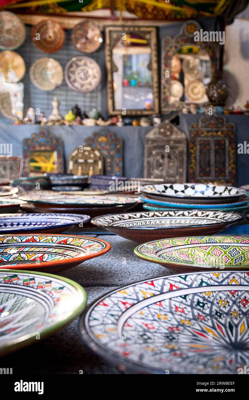 Different dishes and elements of Moroccan crafts, exhibited in medieval market Stock Photo