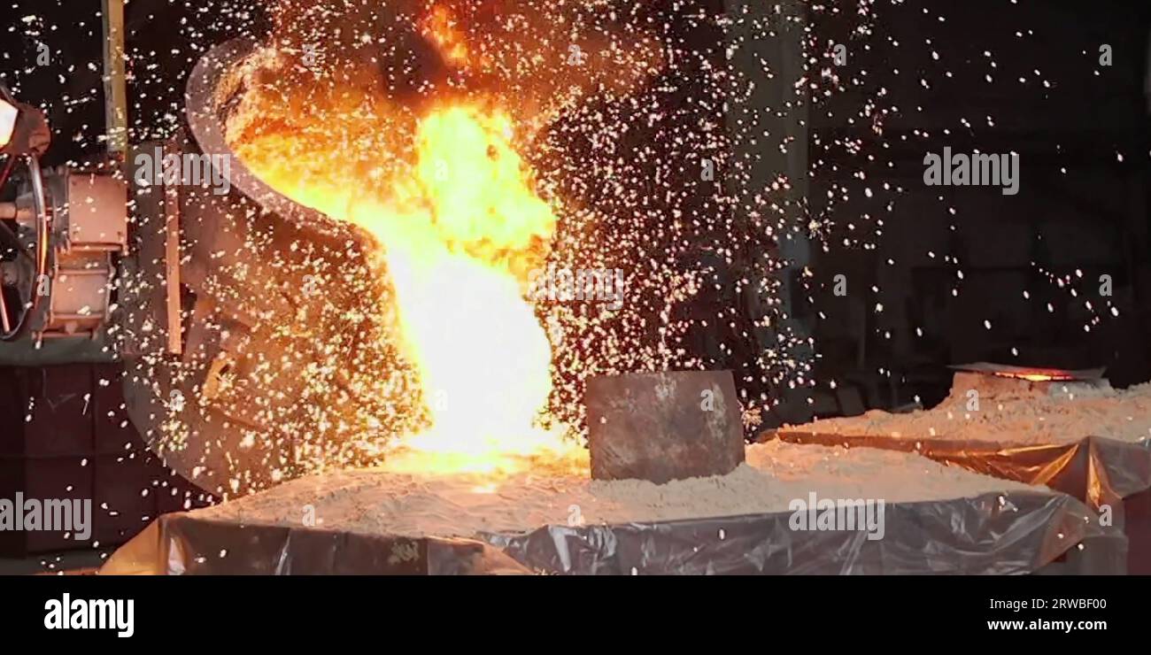 Metal cast process in blast furnace in metallurgical plant or factory