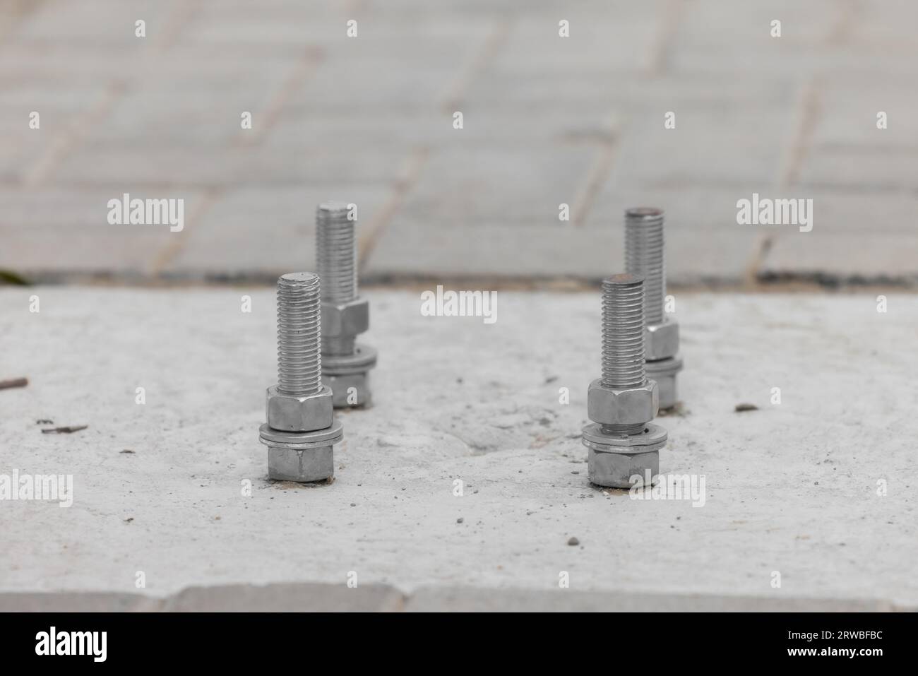 Closeup Anchorage bolt and nut which embedded in concrete structure