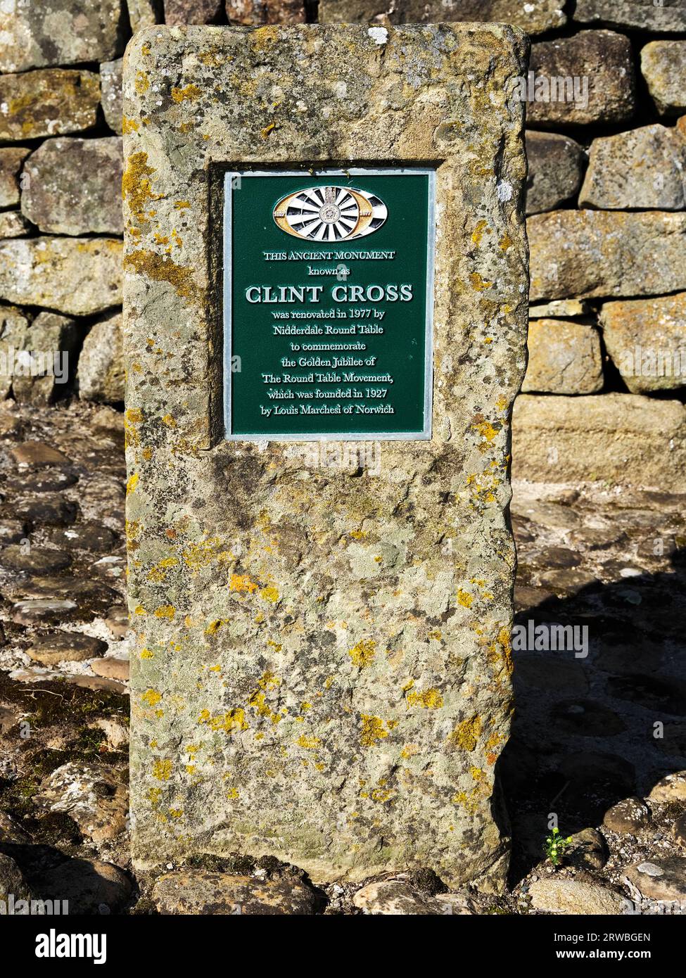 Plaque commemorating the restoration of Clint Cross in 1977 at Clint in Nidderdale North Yorkshire England Stock Photo
