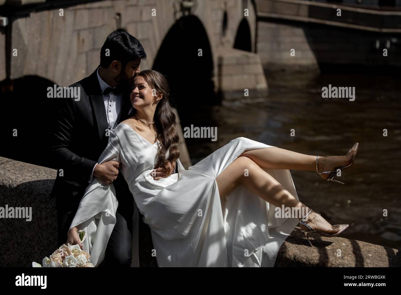 Indian wedding couple kissing on hi-res stock photography and images ...