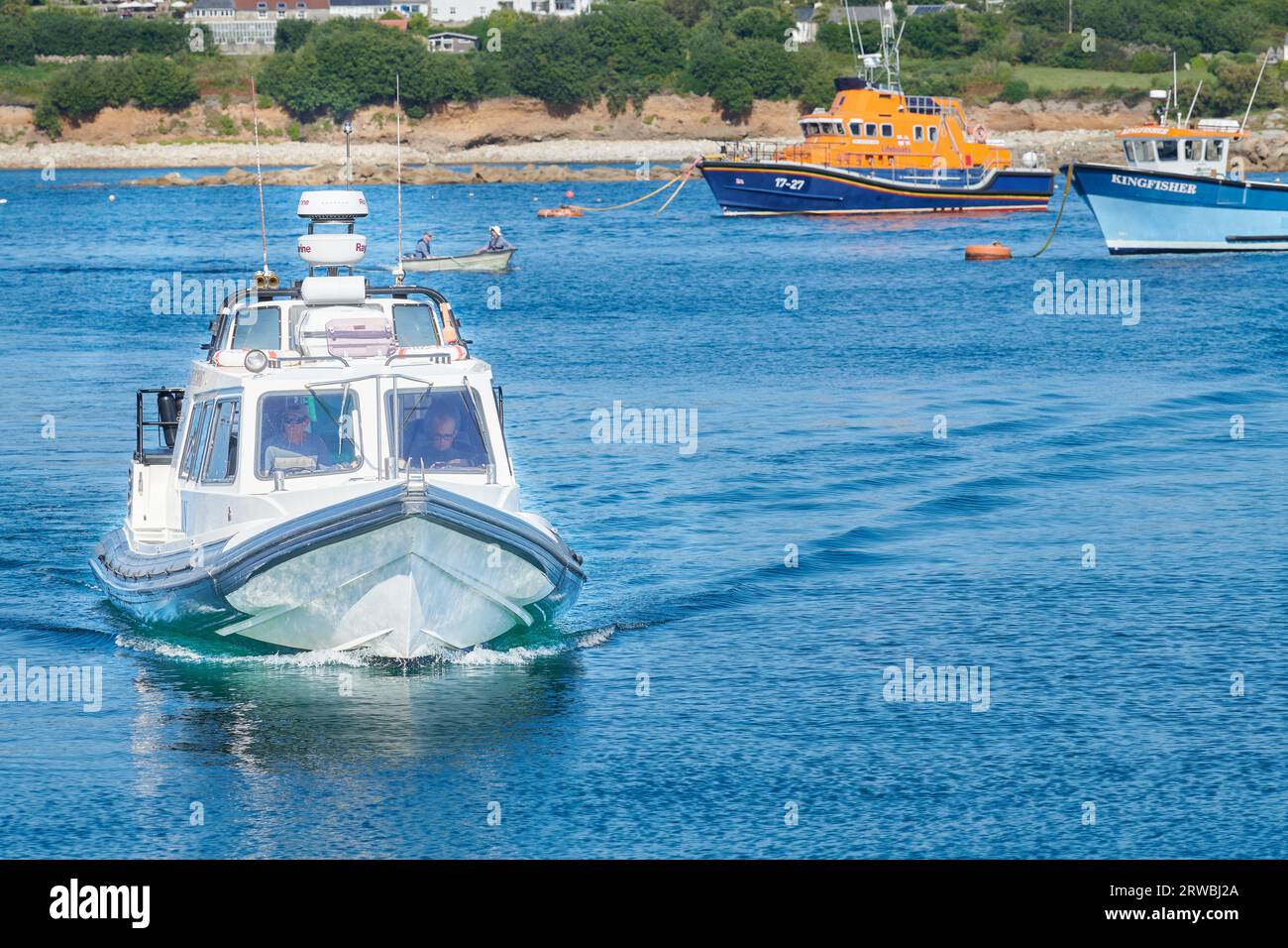 Motor boat in St Mary's harbour, Isles of Scilly. Stock Photo