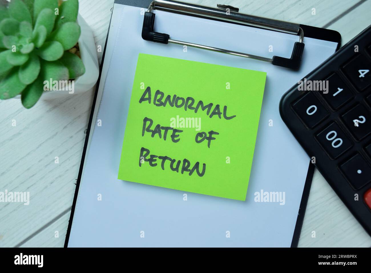 Concept of Abnormal Rate of Return write on sticky notes isolated on Wooden Table. Stock Photo