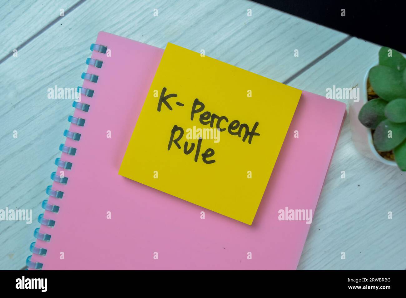 Concept of K-Percent Rule write on sticky notes isolated on Wooden Table. Stock Photo