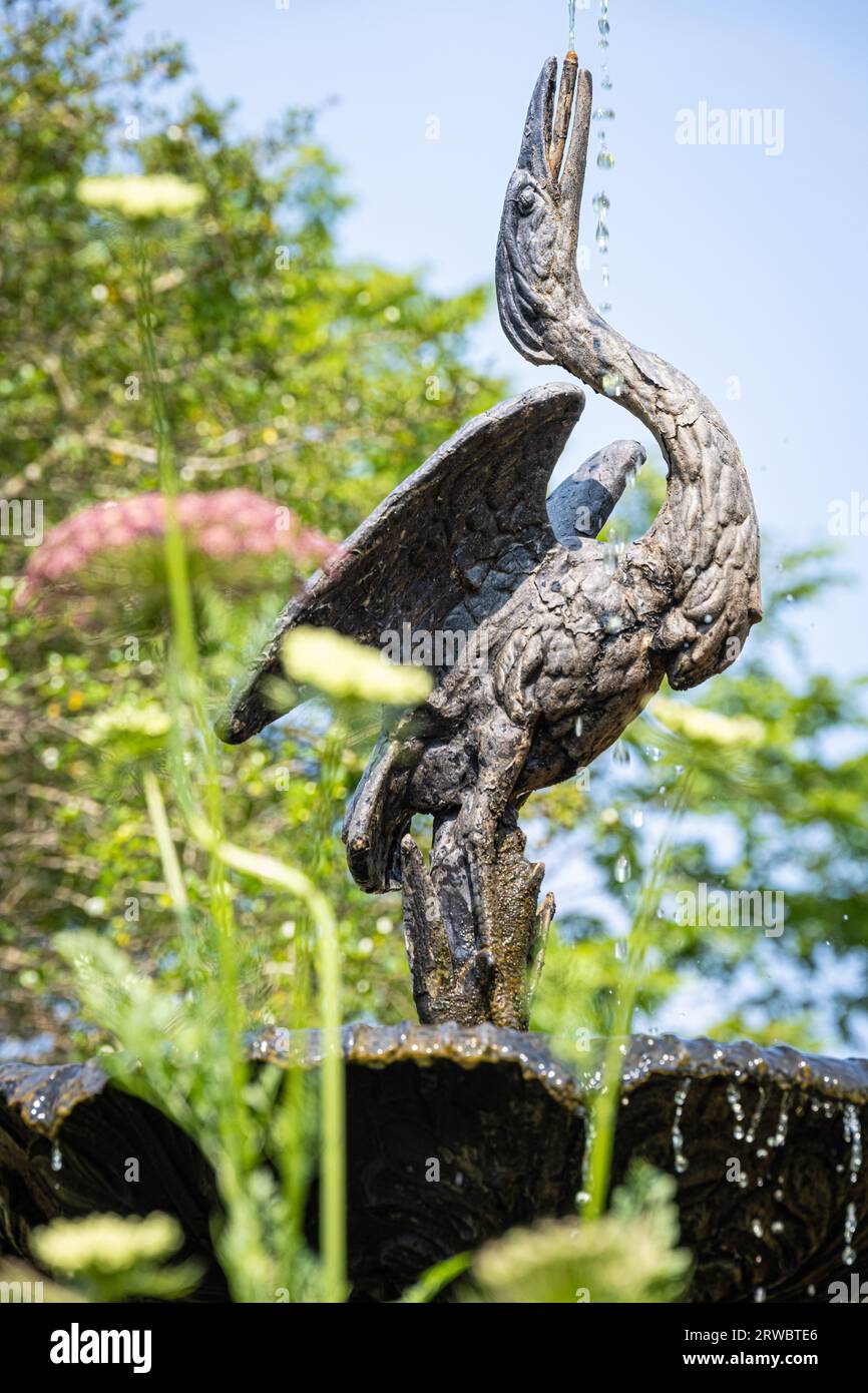 Bittern (heron) fountain in the Heritage Garden at the State Botanical Garden of Georgia, part of the University of Georgia in Athens. (USA) Stock Photo
