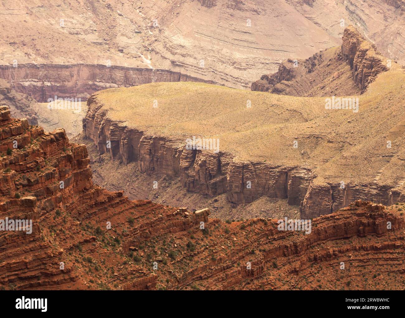 From above rough rocky formations of Grand Canyon located in Arizona on territory of National Park Stock Photo
