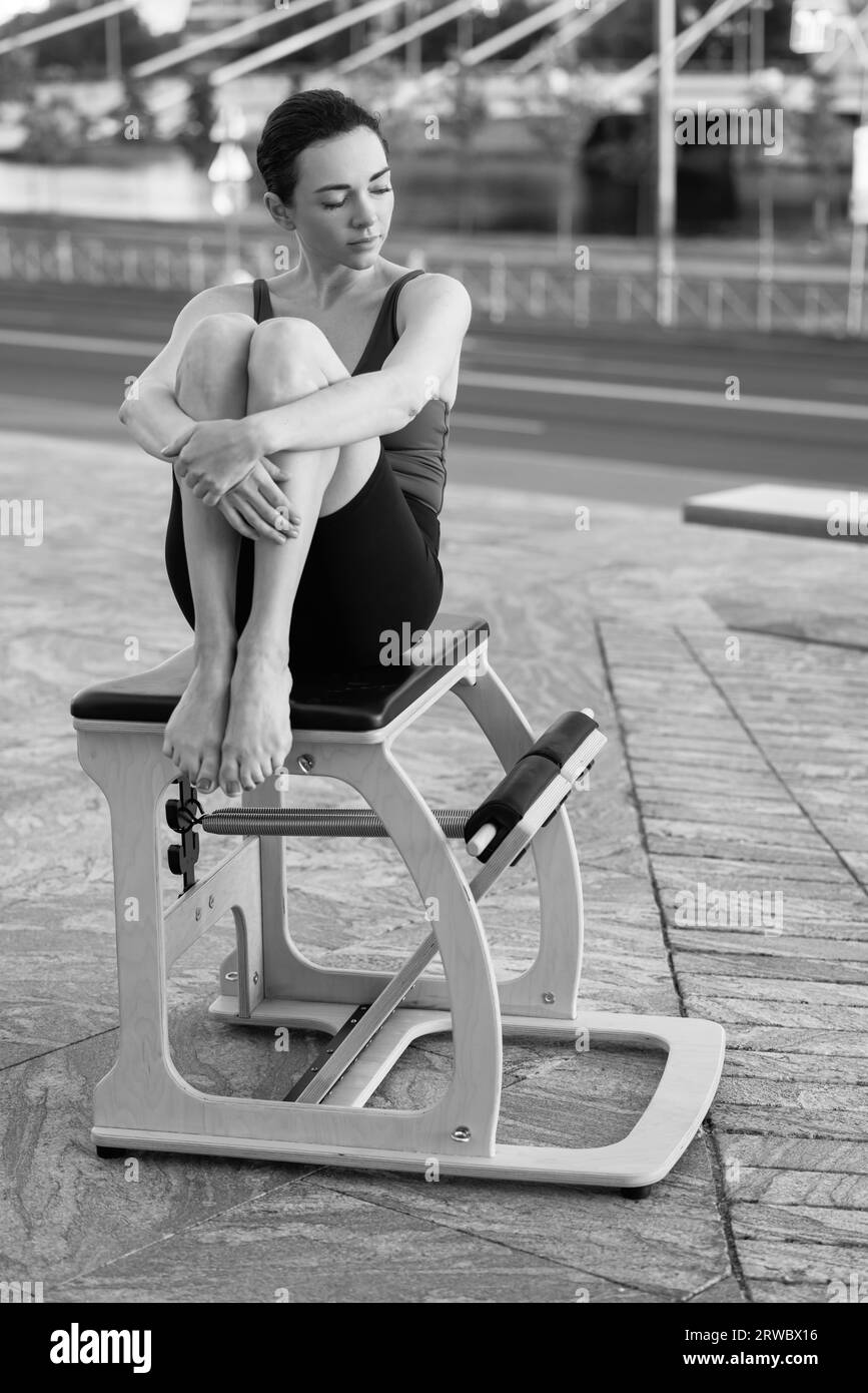 Pilates reformer chair woman fitness yoga gym exercise. Correction of ...