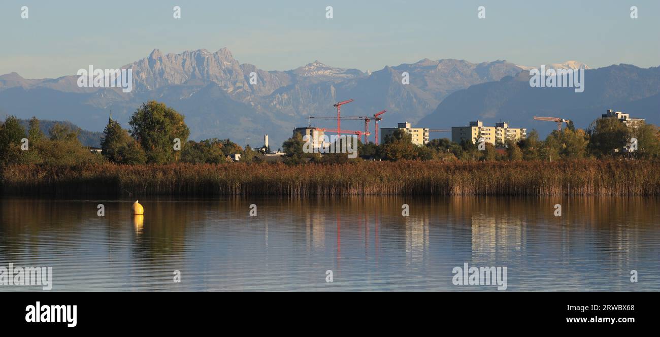 Wetzikon, town in Zurich Canton, shore of Lake Pfaeffikersee and mountain ranges. Stock Photo