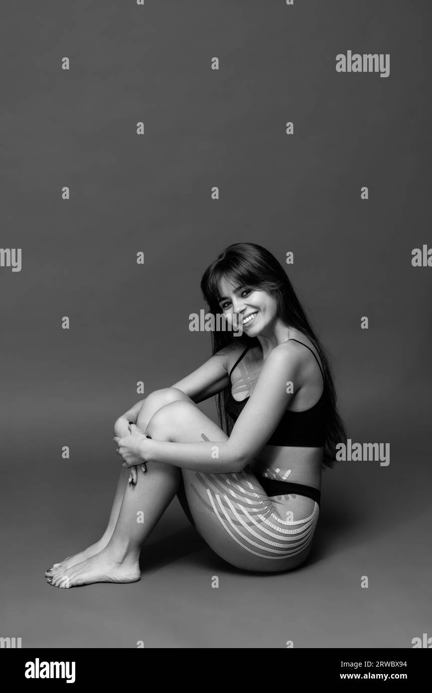 Aesthetic taping for cellulite removal. Cellulite treatment. .Body care