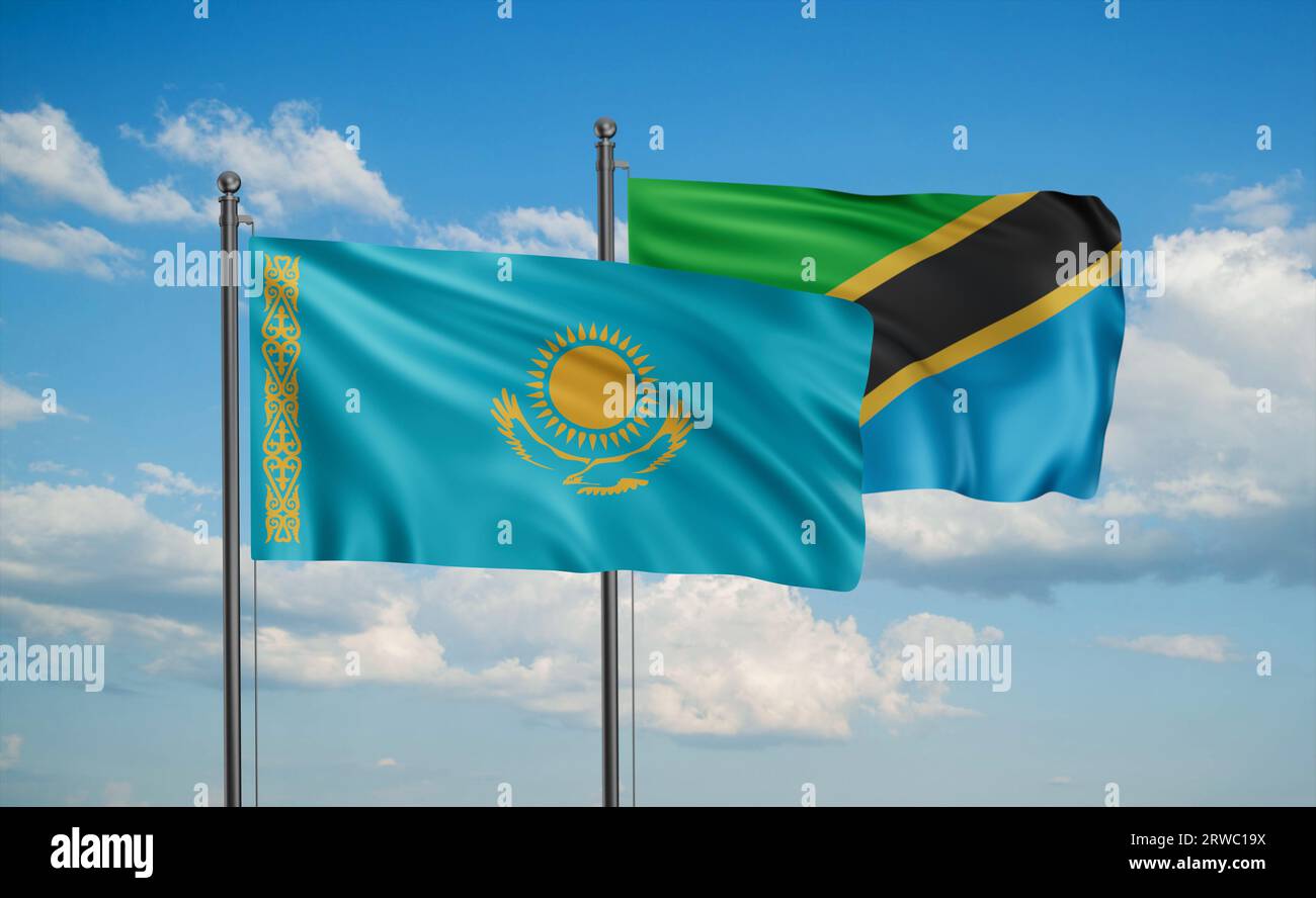 Tanzania and Kazakhstan flag waving together in the wind on blue sky ...