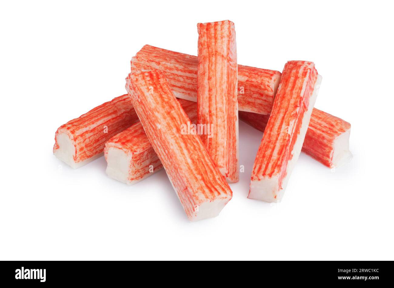 Studio shot of crab sticks cut out against a white background - John Gollop Stock Photo