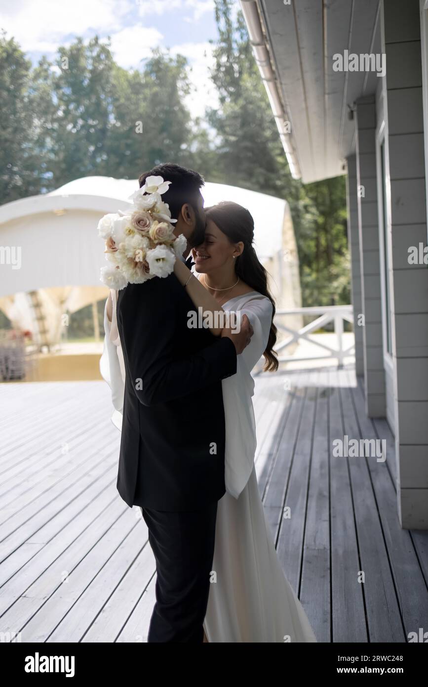 Indian wedding couple kissing on hi-res stock photography and images ...