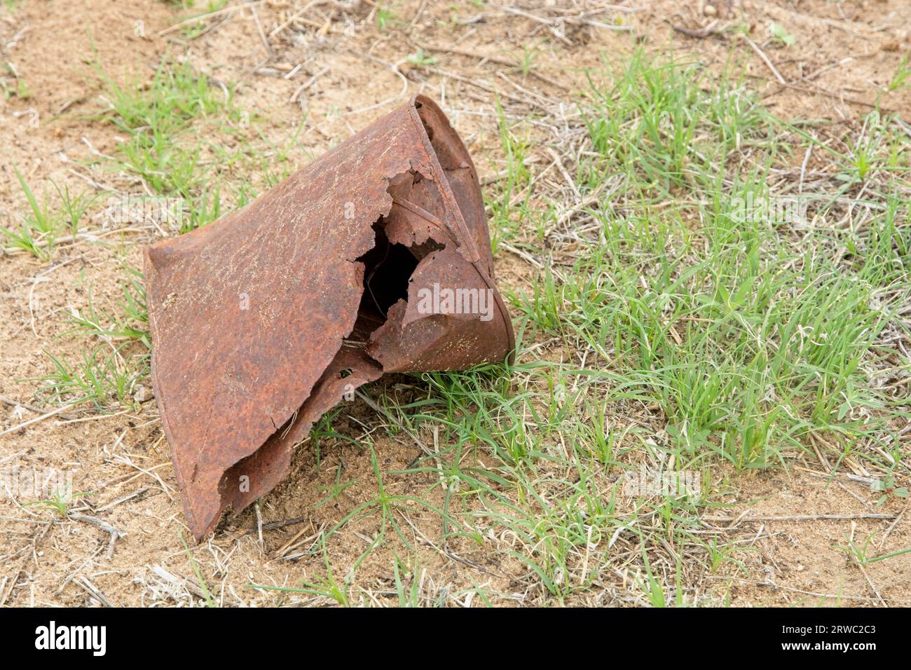 Rusty metal artifact abandoned in fields around Granada  Relocation Center internment camp Stock Photo