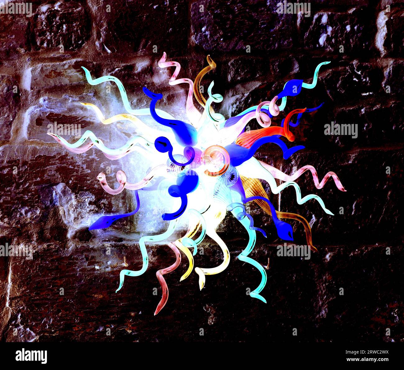 Abstract colorful light on the stone wall Stock Photo