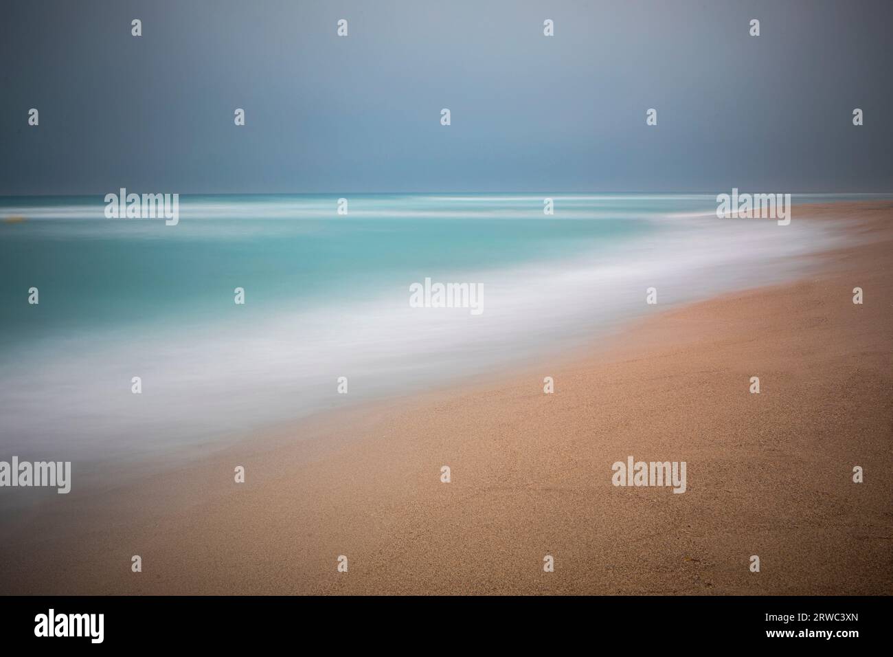 A long exposure shot of the Mediterranean sea on a windy day Stock Photo