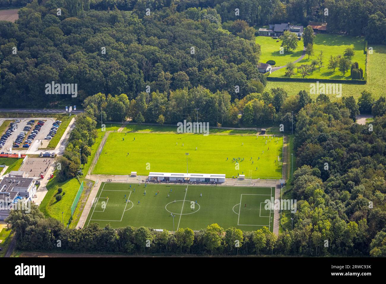 Aerial view, new construction sports field with stands as well as club building with sports day care center, An der Lohschule, Rhynern, Hamm, Ruhrgebi Stock Photo
