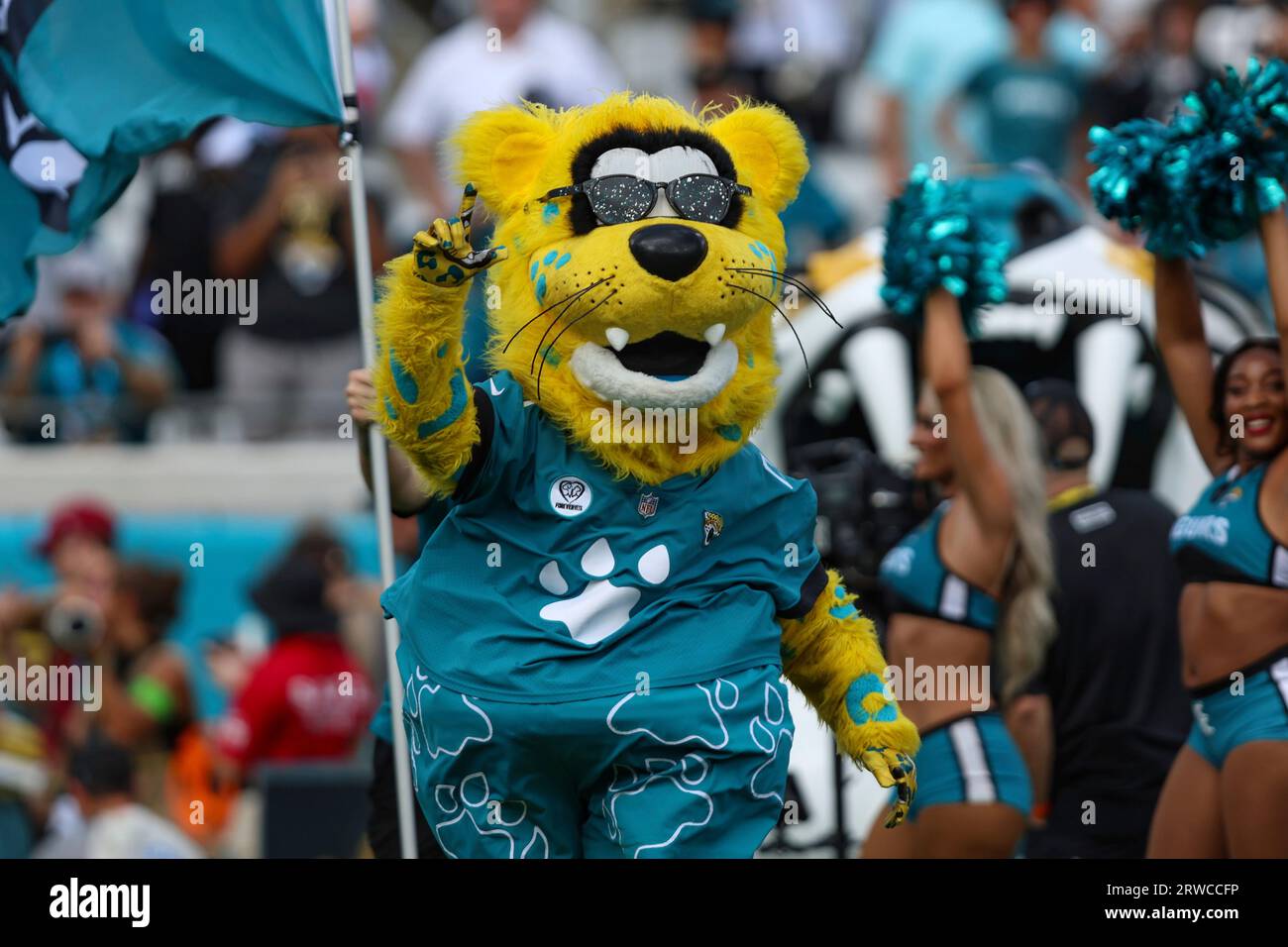 Jacksonville Jaguars fans pose for photos outside the stadium before an NFL  football game against the Tennessee Titans, Saturday, Jan. 7, 2023, in  Jacksonville, Fla. (AP Photo/Phelan M. Ebenhack Stock Photo - Alamy