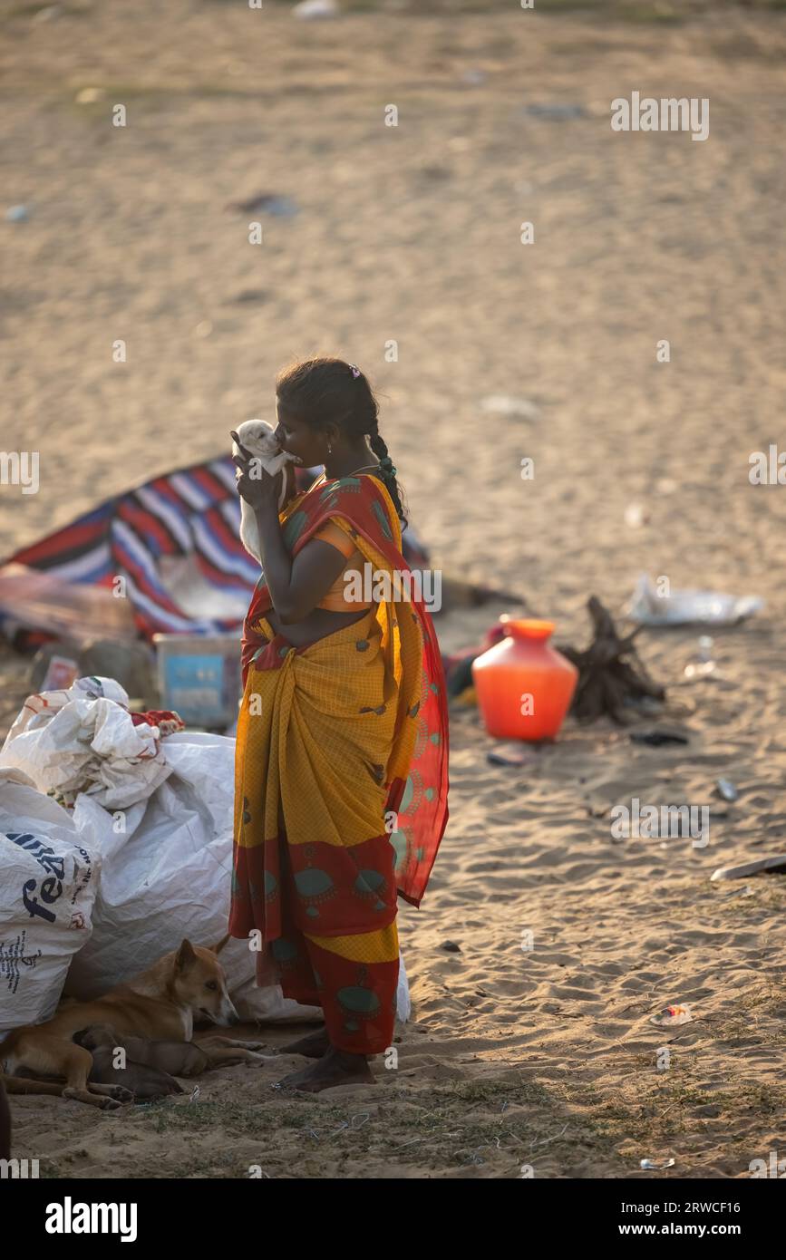 February 14, 2023, Chennai city, India: Nomadic people of India in their traditional clothes, against the backdrop of their place of residence. High q Stock Photo