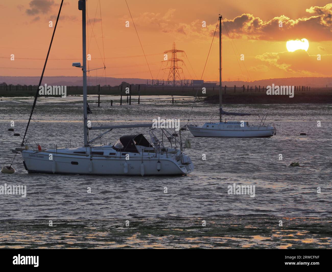 Queenborough, Kent, UK. 18th Sep, 2023. UK Weather: yachts at sunset in Queenborough harbour, Kent. Credit: James Bell/Alamy Live News Stock Photo
