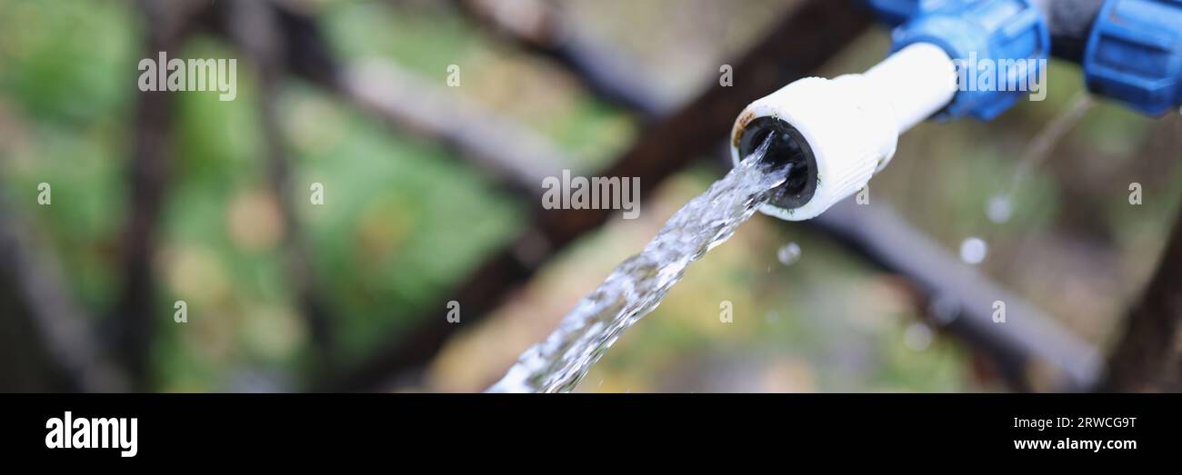 Polyethylene water pipes and clean water jet closeup Stock Photo Alamy