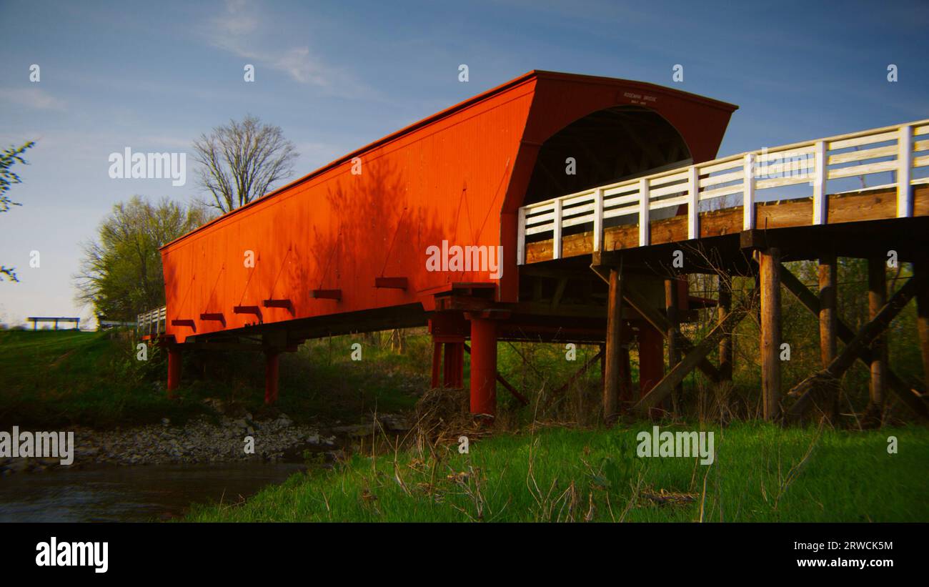 The famous Roseman covered bridge on a beautiful spring evening in Madison County Iowa. Stock Photo