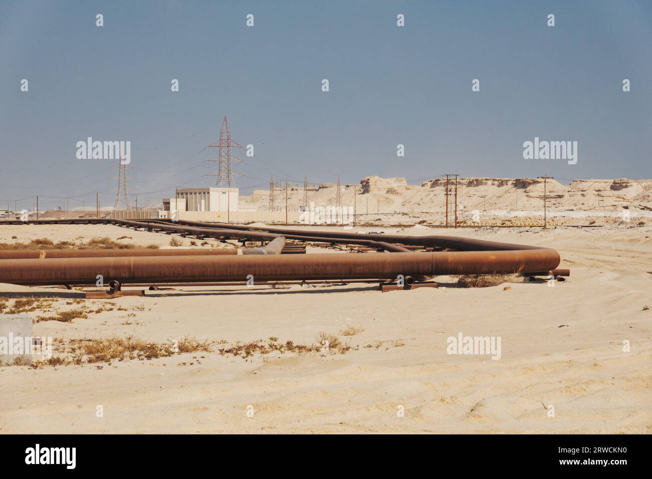 a natural gas pipeline sprawls across the desert in the Middle Eastern