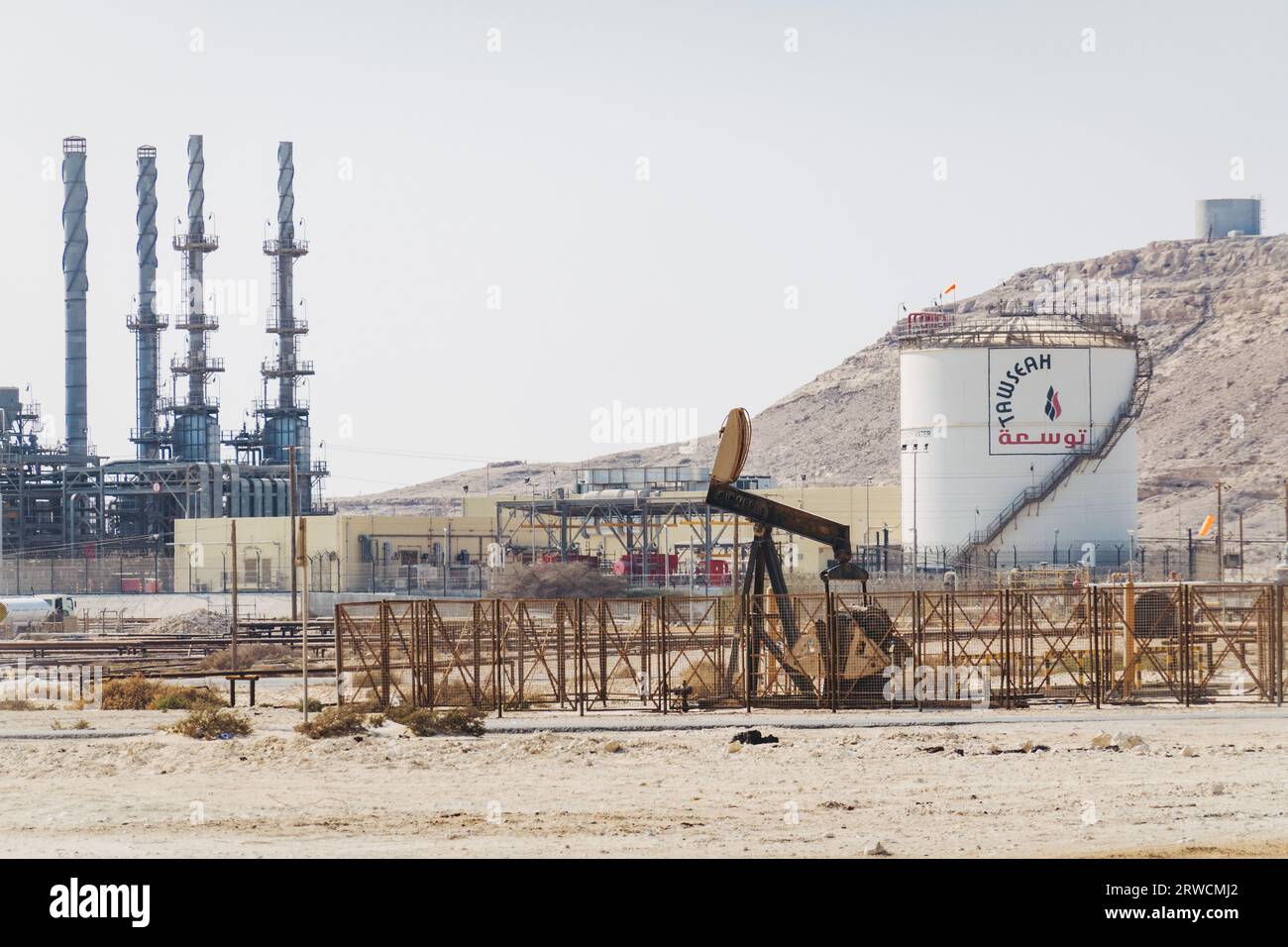 natural gas pipelines, storage tanks and processing units in the desert