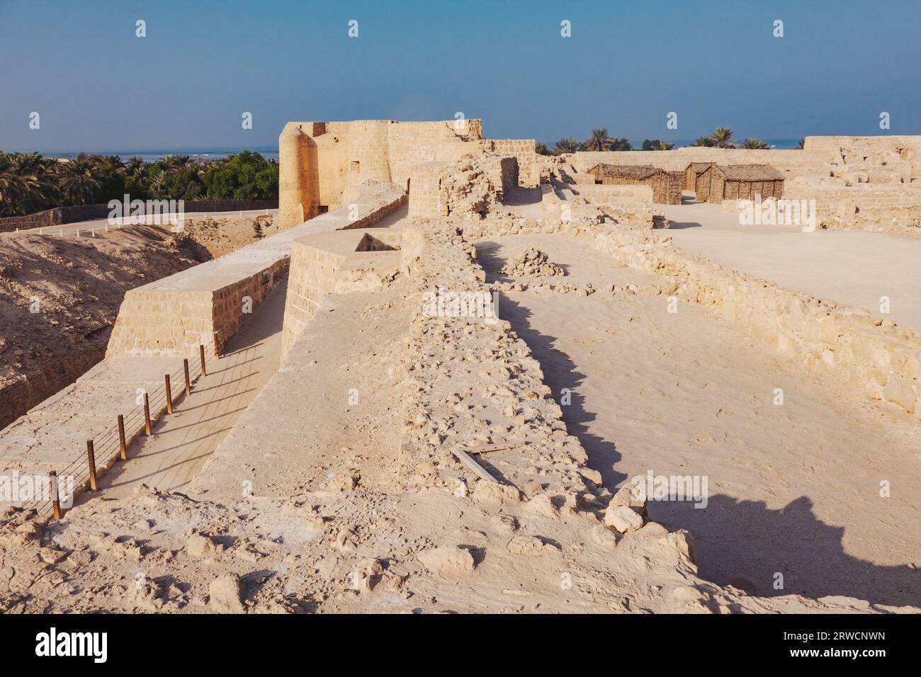 Qal'at al-Bahrain, a fort dating back to 2300 BCE and abandoned by the Portuguese in the 16th century, on the northern coast of Bahrain island Stock Photo