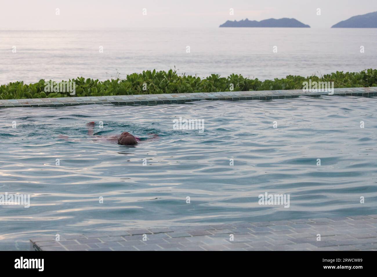 Aerial view of a woman swimming in ocean hi-res stock photography and ...