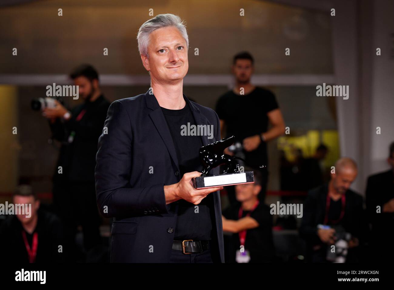 Venice, Italy. 18th Sep, 2023. Winner of the Best Restored Film Award for 'Ohikkoshi (Moving)' poses at the winner's photocall at the 80th Venice International Film Festival (Photo by Daniele Cifala/NurPhoto) Credit: NurPhoto SRL/Alamy Live News Stock Photo