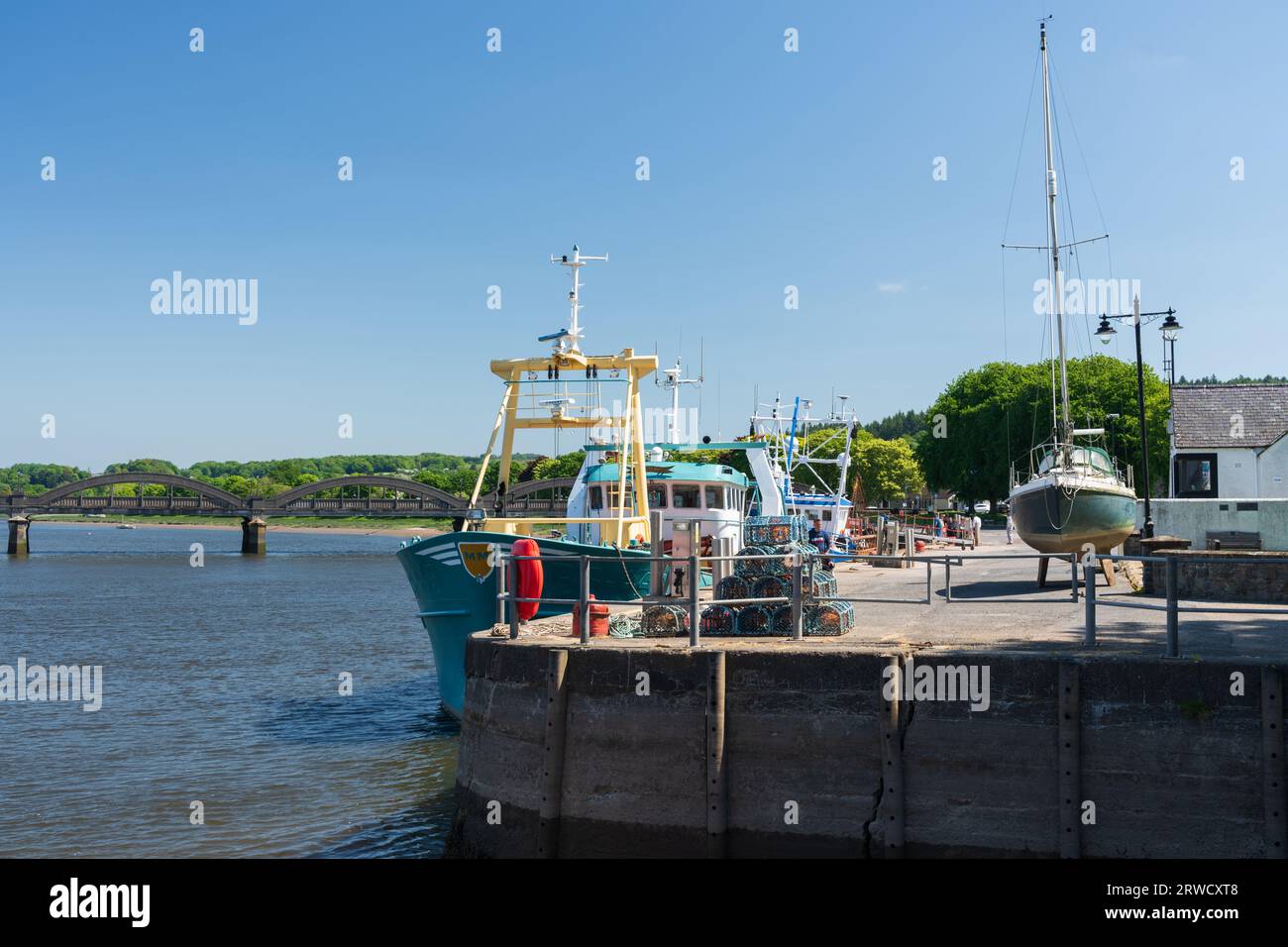Fishing boats in the working fishing port of Kirkudbright. Stock Photo