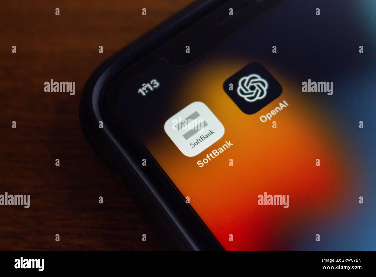 Vancouver, CANADA - Sep 18 2023 : Conceptual image of SoftBank and OpenAI icons seen in iPhone screen. Stock Photo