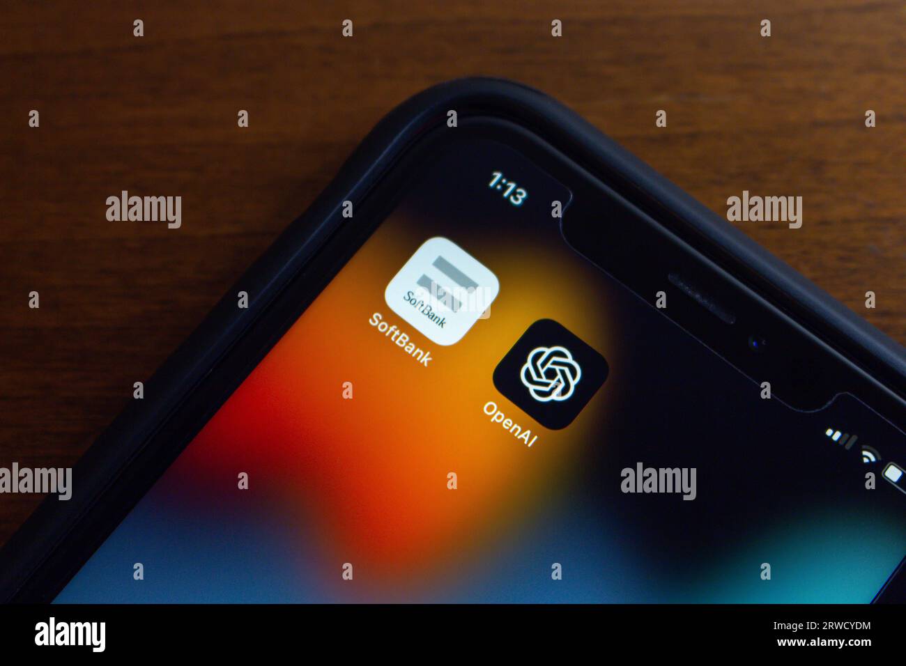 Vancouver, CANADA - Sep 18 2023 : Conceptual image of SoftBank and OpenAI icons seen in iPhone screen. Stock Photo