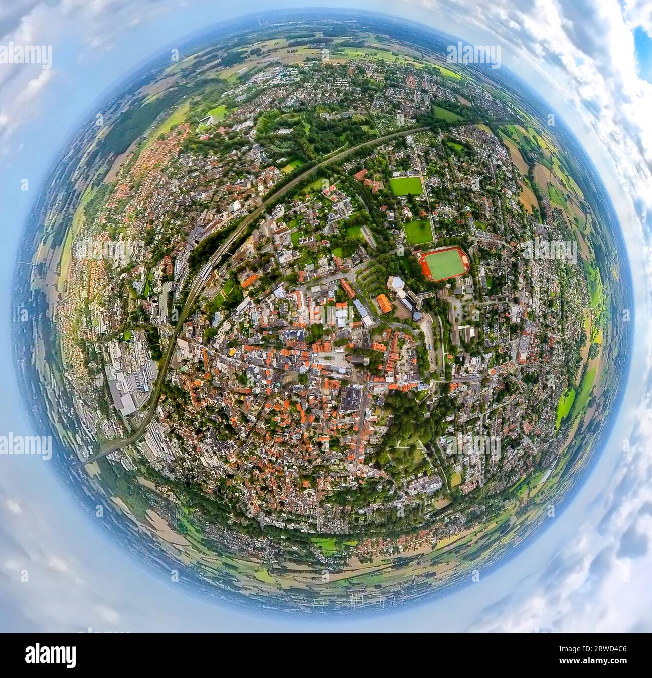 Aerial view, city view with train station Ahlen(Westf), Lindensportplatz, globe, fisheye shot, 360 degree shot, tiny world, Ahlen, Ruhrgebiet, North R Stock Photo