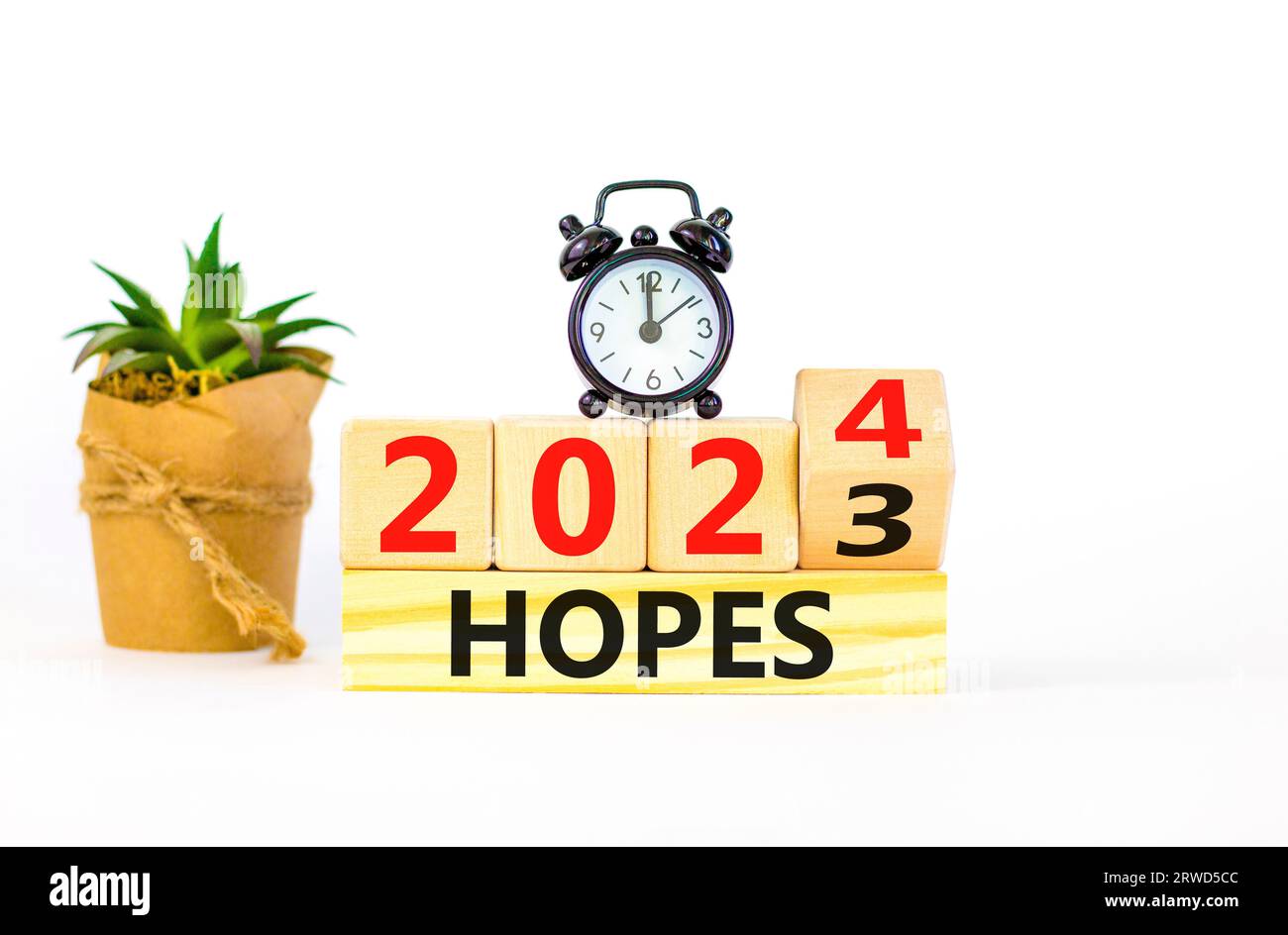 2024 Hopes New Year Symbol Businessman Turns A Wooden Cube And Changes   2024 Hopes New Year Symbol Businessman Turns A Wooden Cube And Changes Words Hopes 2023 To Hopes 2024 Beautiful White Background Copy Space Busine 2RWD5CC 