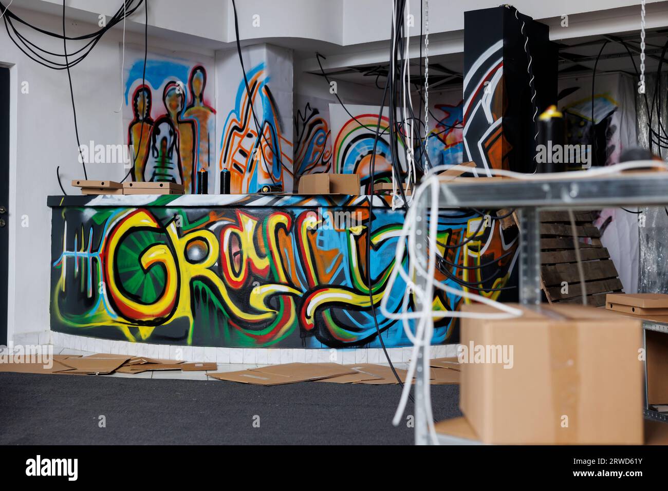 Deserted warehouse with creepy and neglected structure, messy spray