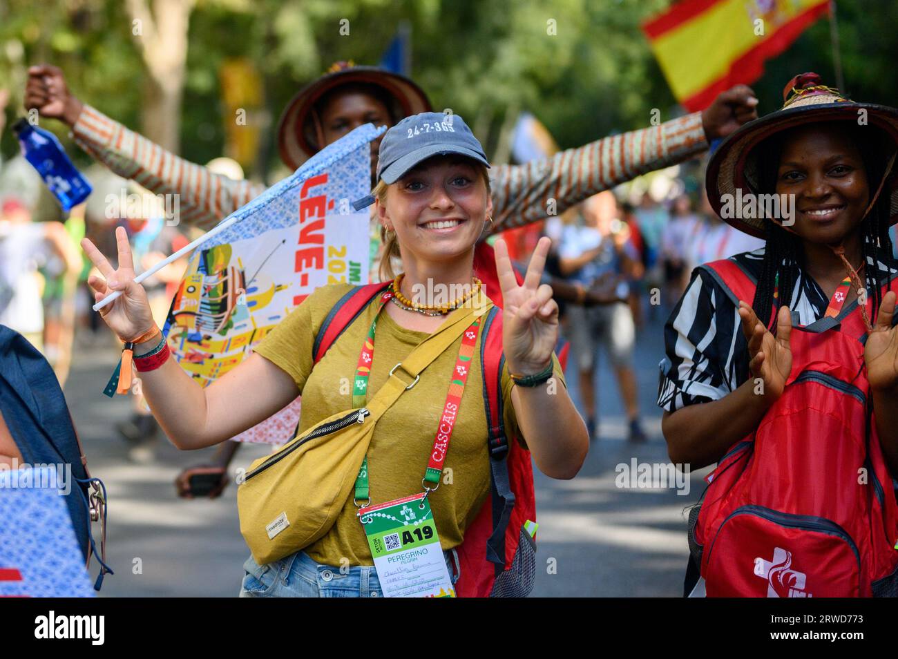 Pilgrims on their way to the opening Holy Mass in Parque Eduardo VII on the first day of World Youth Days 2023 in Lisbon, Portugal. Stock Photo