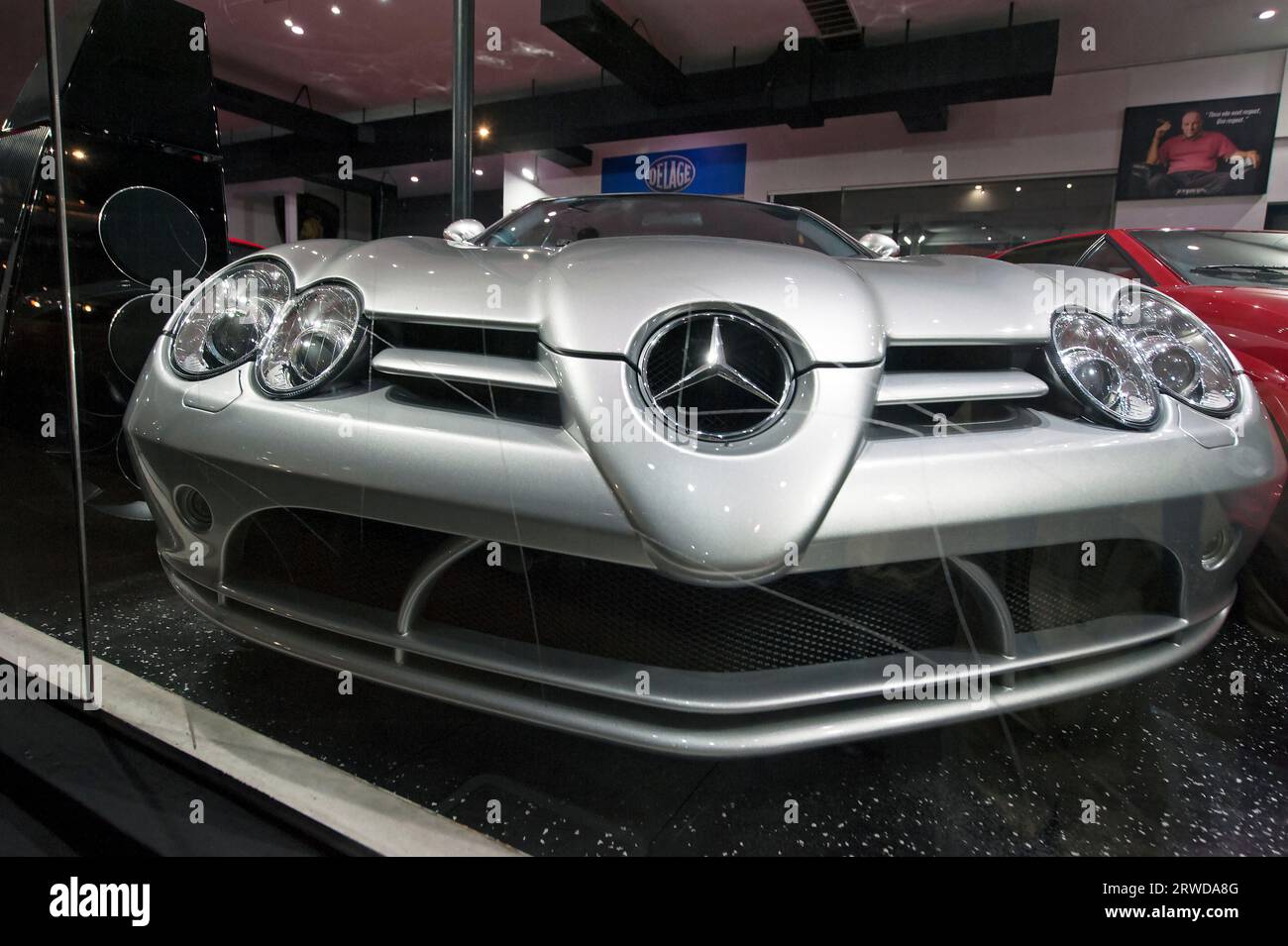 Mercedes Benz sports car in auto dealer window on Sunset Blvd. in