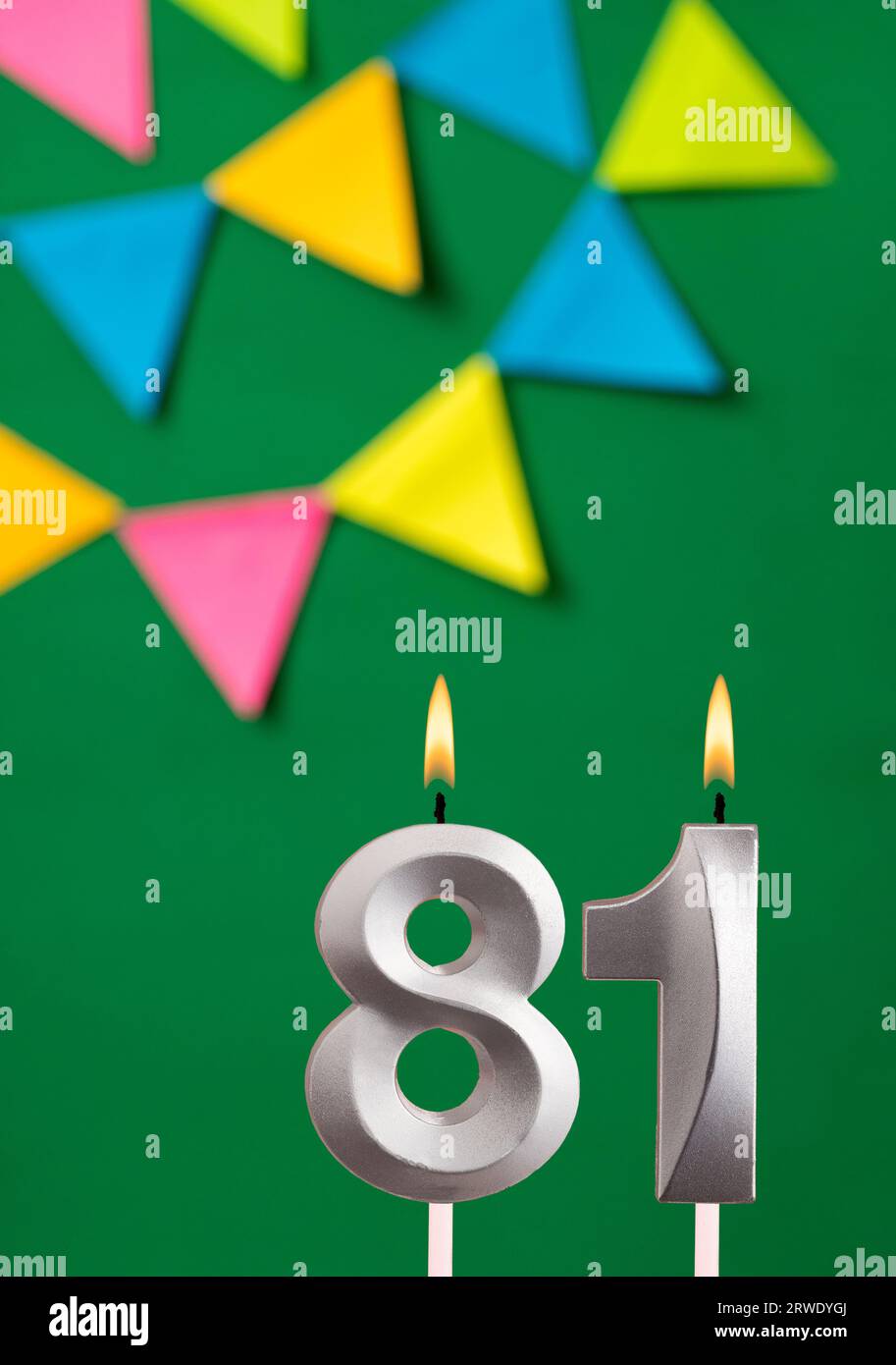 Candle number 81 birthday - Green anniversary card with pennants Stock