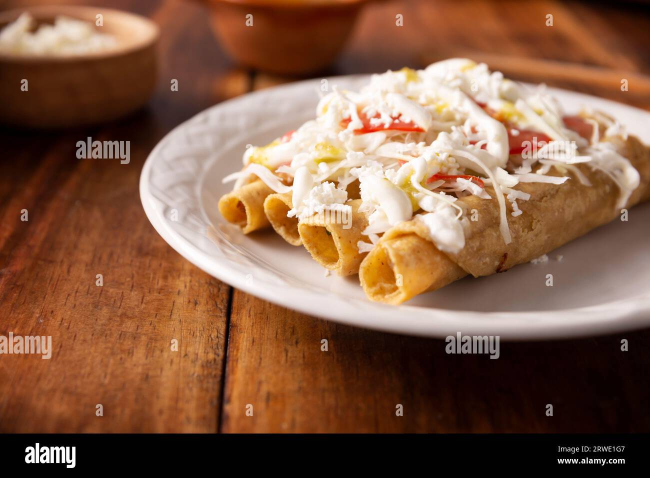 Tacos Dorados. Mexican dish also known as Flautas, consists of a rolled
