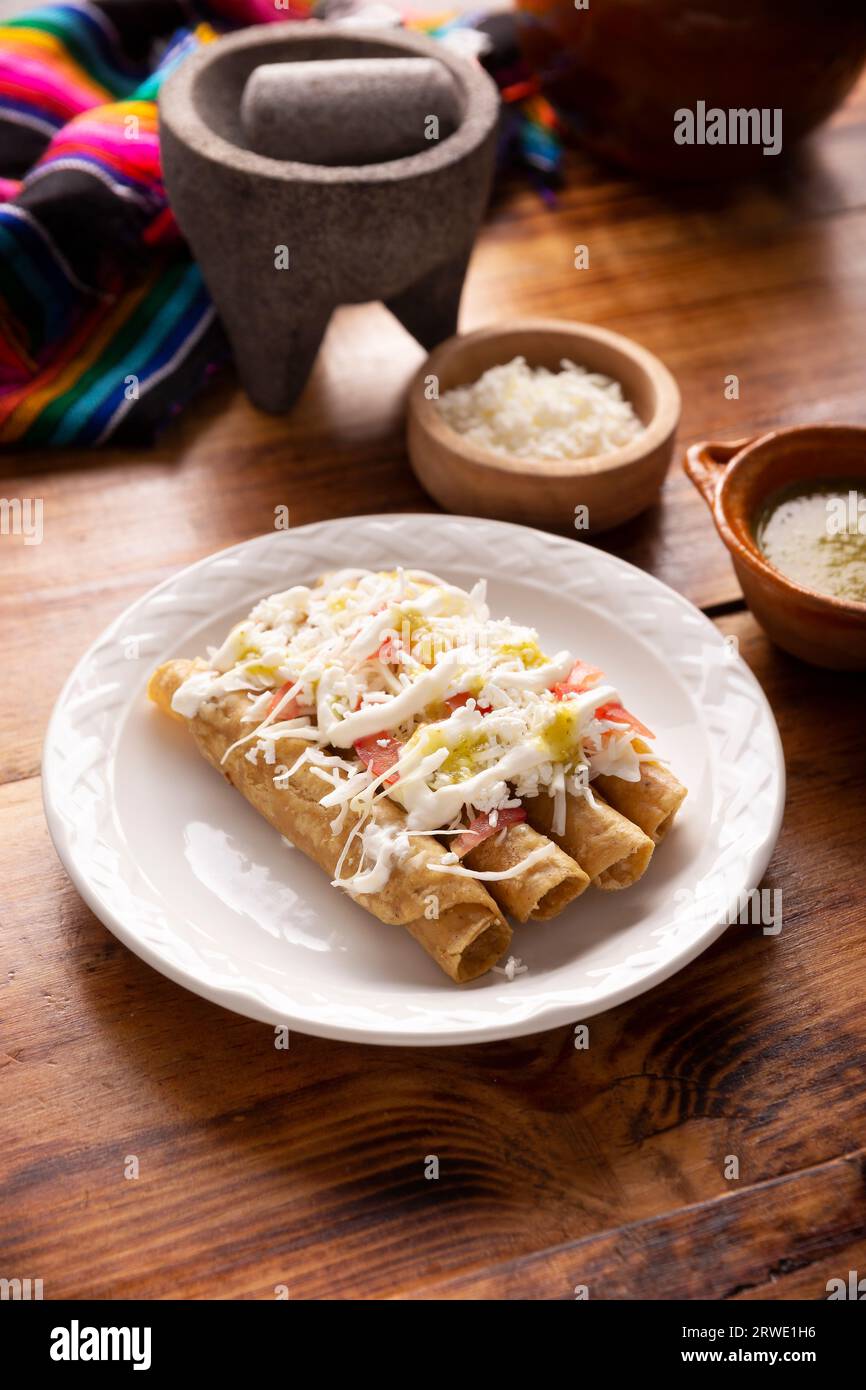 Tacos Dorados. Mexican dish also known as Flautas, consists of a rolled corn tortilla with some