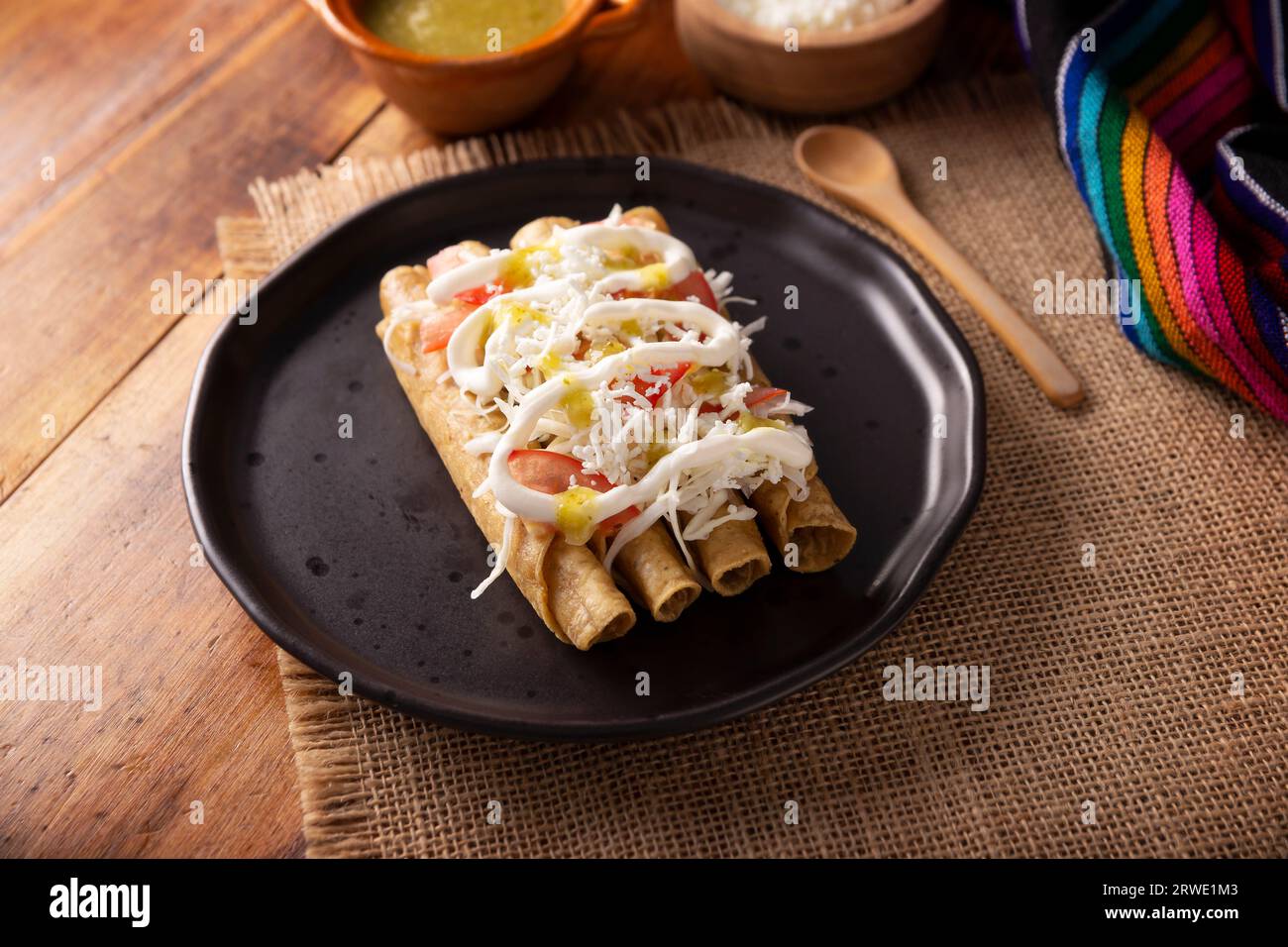 Tacos Dorados. Mexican dish also known as Flautas, consists of a rolled corn tortilla with some