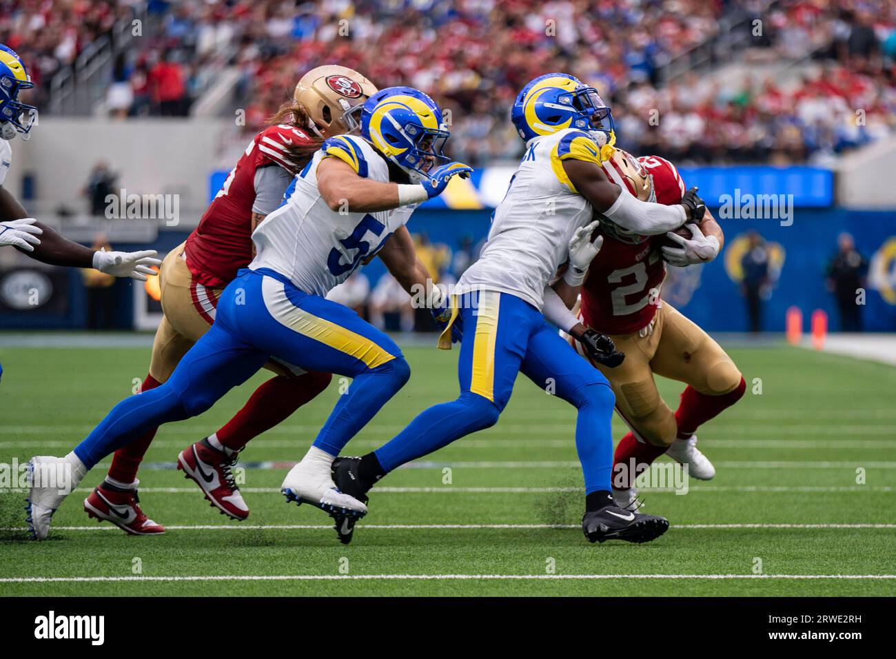 Los Angeles Rams cornerback Derion Kendrick (1) wraps up San Francisco