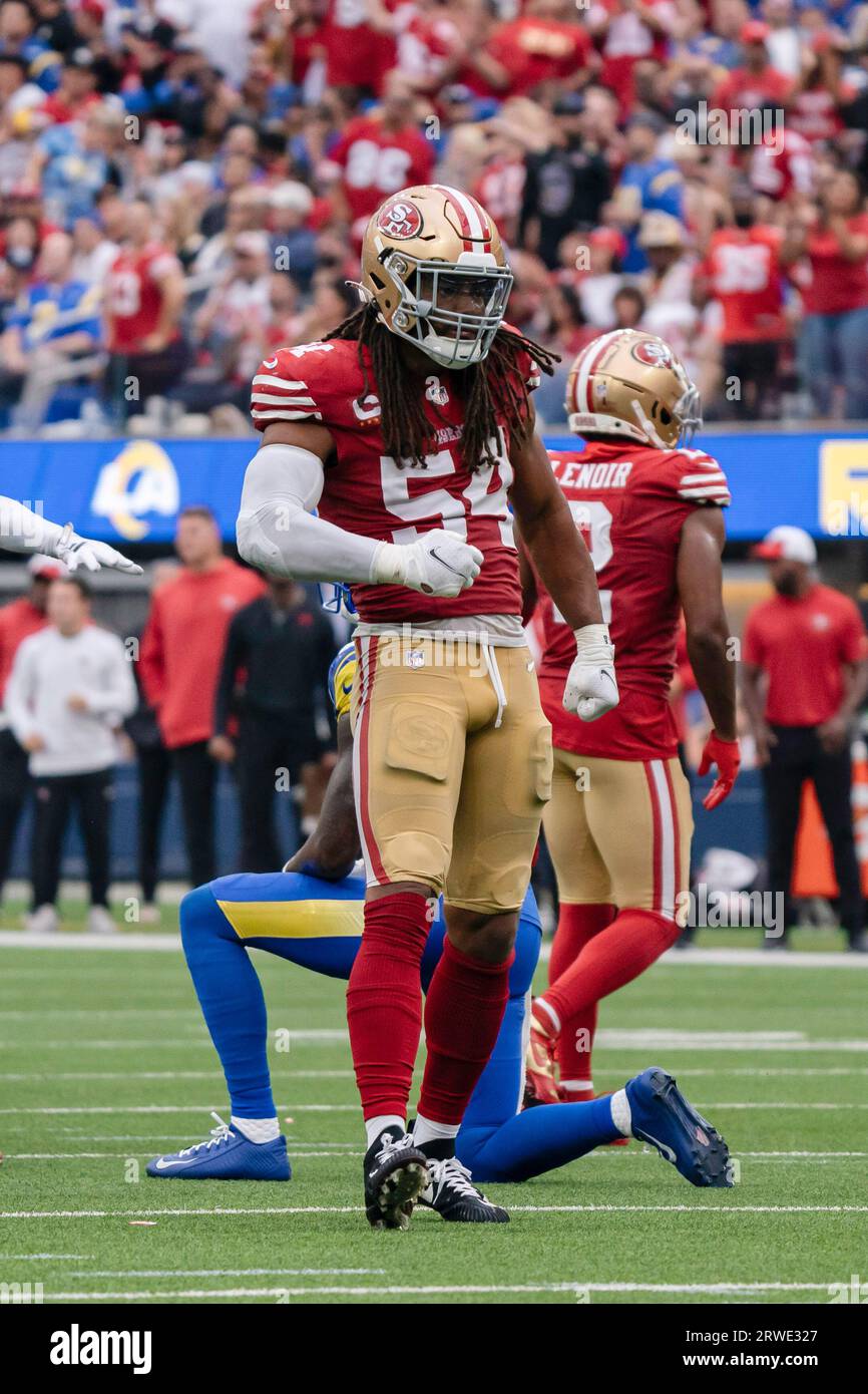 San Francisco 49ers Fred Warner (48) celebrates as Detroit Lions Theo  Riddick holds his head after missing a Matthew Stafford pass on third down  in the last minute at Levi's Stadium in