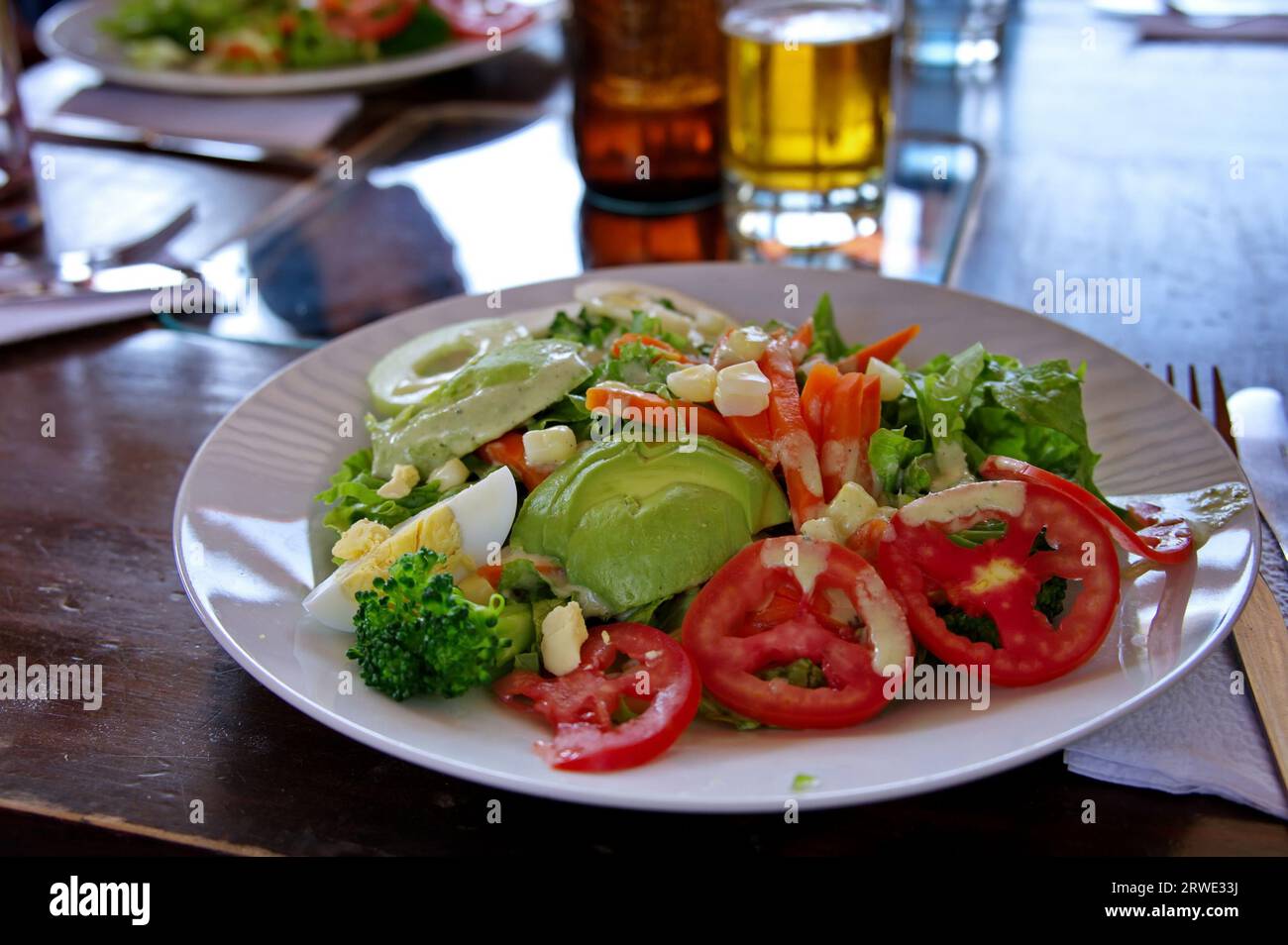 Mixed salad on the rustic wooden table Stock Photo