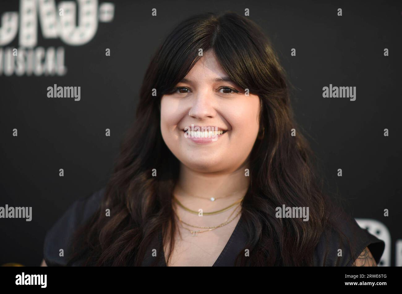 Julie Diaz arrives at the premiere of "Dicks: The Musical" on Monday