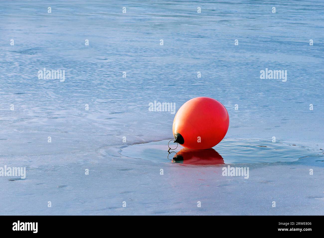 Buoy in the ice Stock Photo
