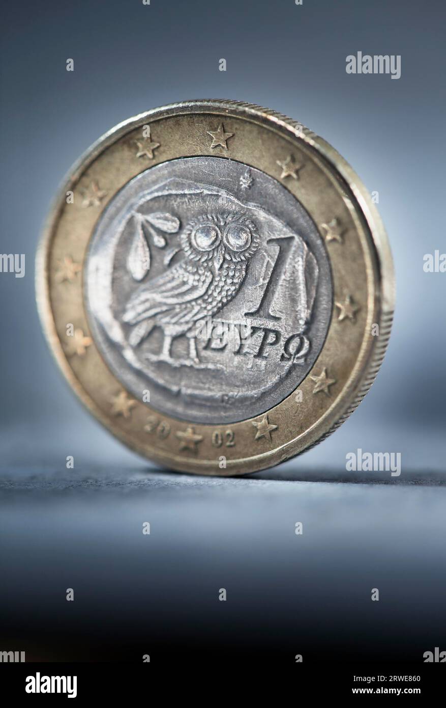 A worn and dirty Greek Euro coin. Short depth of field Stock Photo