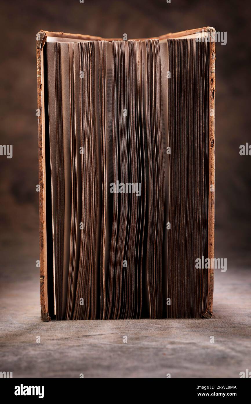 Old worn and tattered book Stock Photo - Alamy
